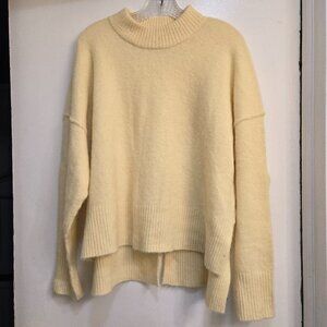 Loose fit yellow sweater from Denmark